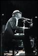A picture containing person, concert, person, clothing

Description automatically generated