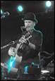 A person playing a guitar

Description automatically generated with medium confidence
