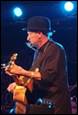 A person playing a guitar

Description automatically generated with medium confidence
