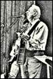 A person playing a guitar

Description automatically generated with low confidence