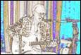 A person playing guitar and singing

Description automatically generated with low confidence