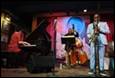 A group of people playing instruments

Description automatically generated with low confidence