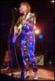 A person playing a guitar

Description automatically generated with medium confidence