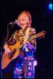 A person singing and playing guitar

Description automatically generated with low confidence
