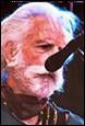 A person with white hair and beards

Description automatically generated with low confidence