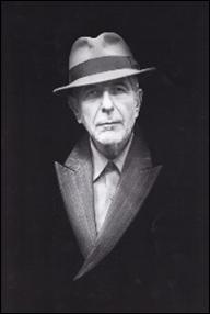A person in a suit and hat

Description automatically generated